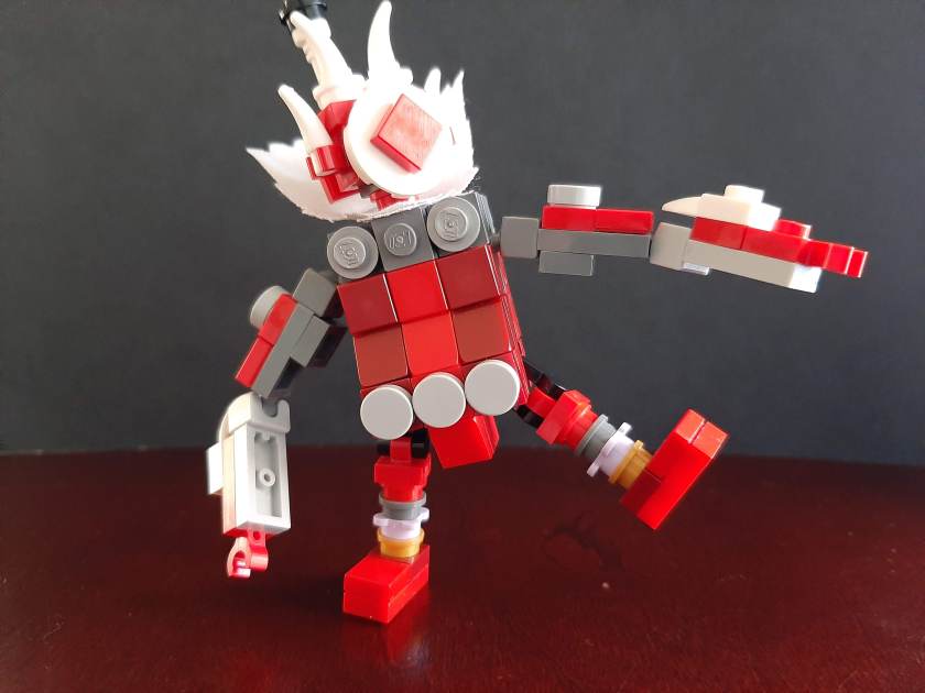 lego master kohga in a kicking pose